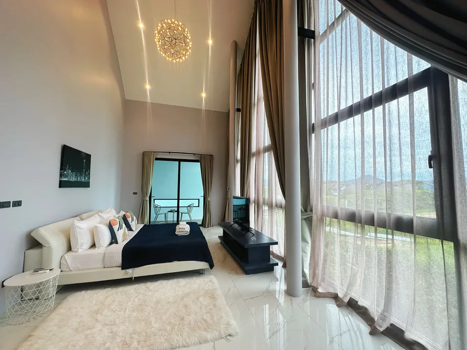 The double-height glazed living room