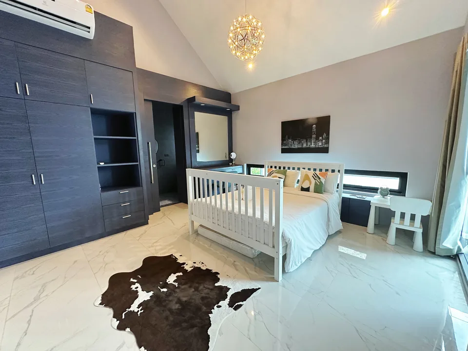 A bedroom with a cot