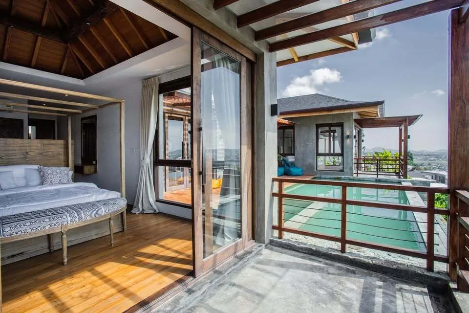 The timber walkway beside the infinity pool