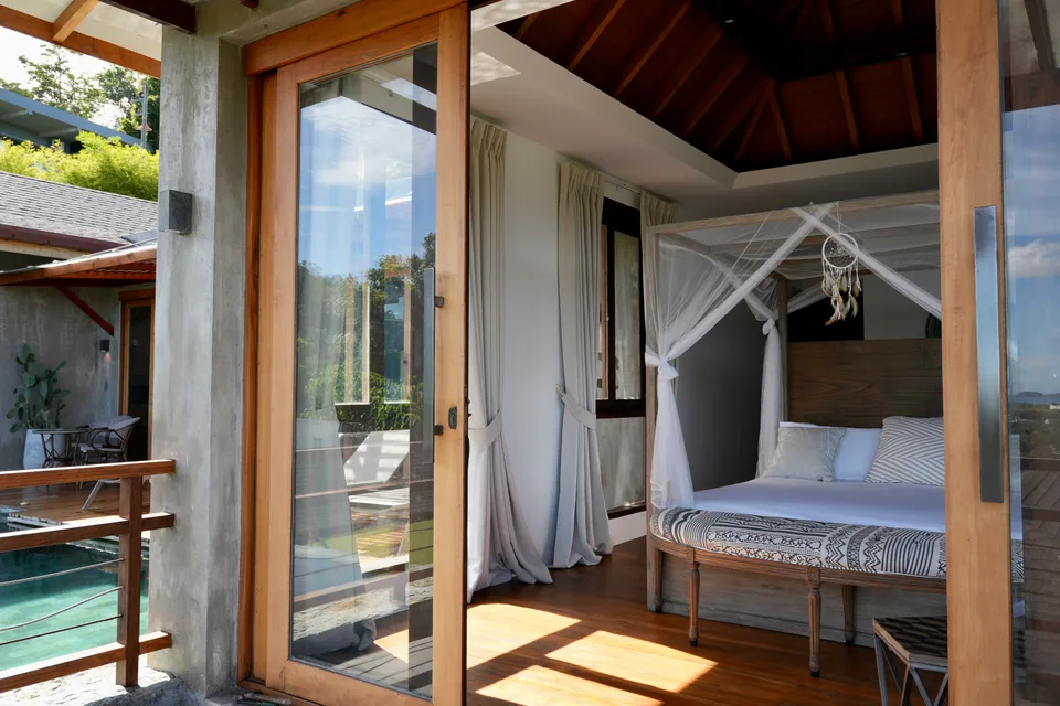 The covered terrace beside the pool