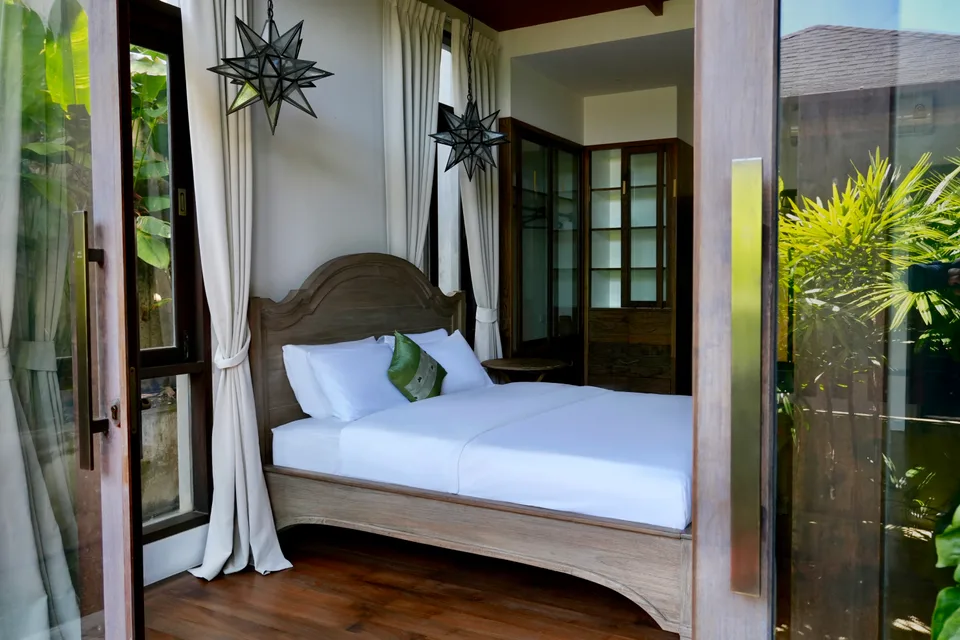 An open-air daybed in the shade