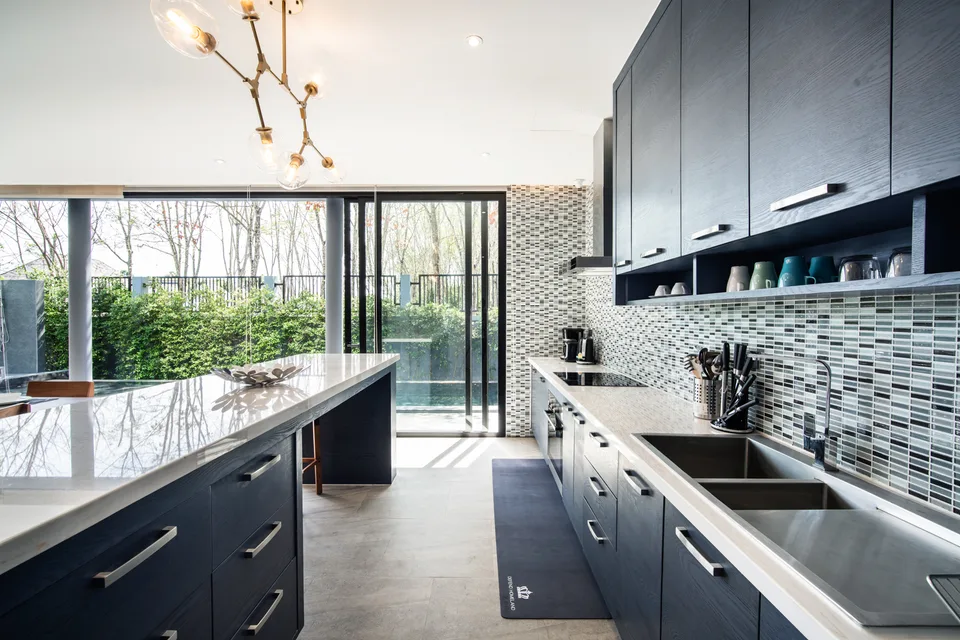 Dining and kitchen with garden views