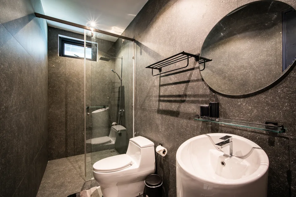 Guest bathroom with arched mirror